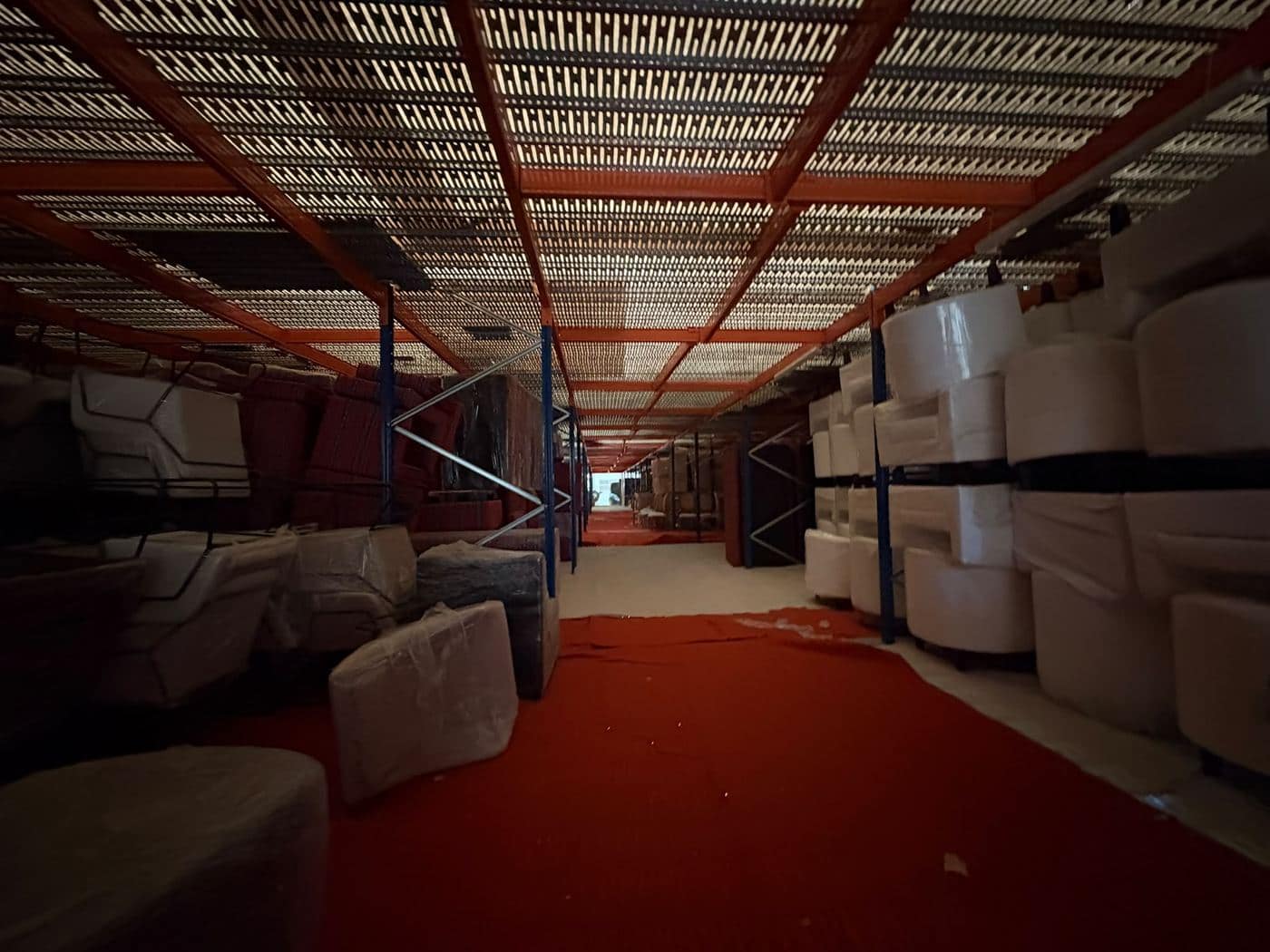 Racked mezzanine storage aisles at Logistick Solutions' Dubai facility